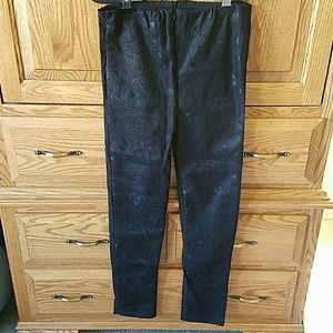 Small black leggings with front zipper