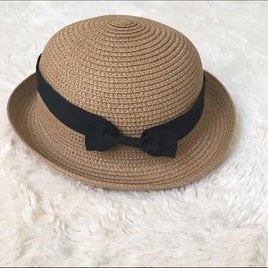 Straw bowler hat