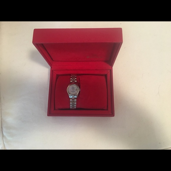 Ladies Rolex with Mother of Pearl and Diamond Face