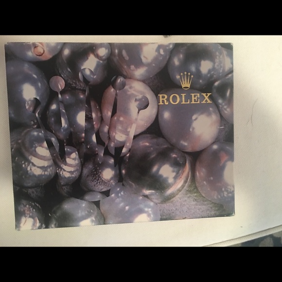Ladies Rolex with Mother of Pearl and Diamond Face
