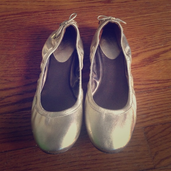 Maria Sharipova for Cole Haan gold leather flats