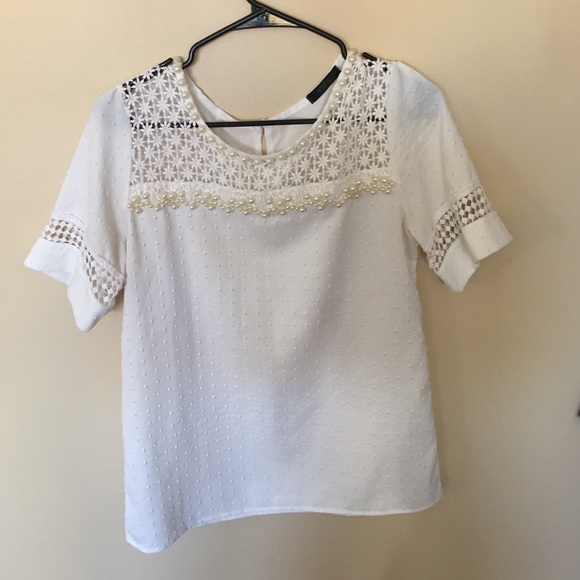 White beaded and textured blouse