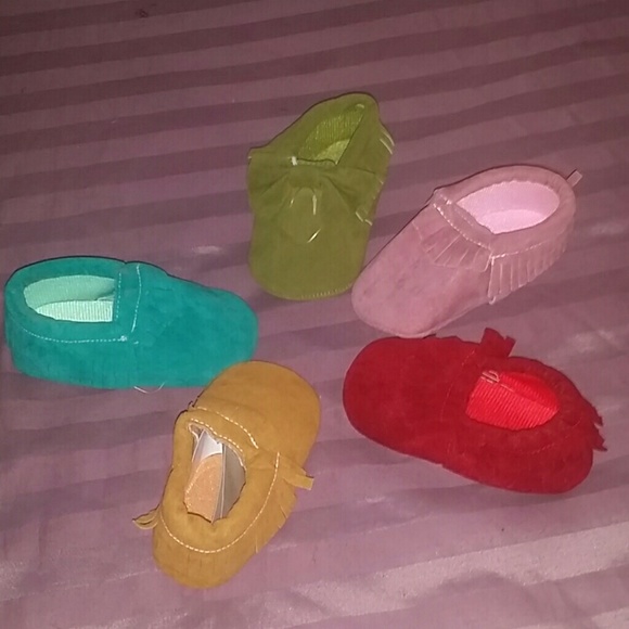 Lot of moccasins baby shoes