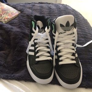 Adidas high top big tongues