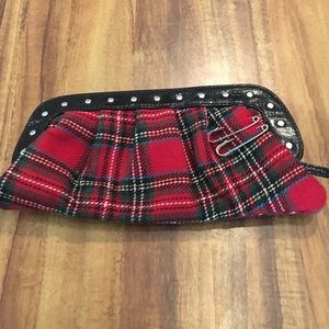 Small studded plaid clutch
