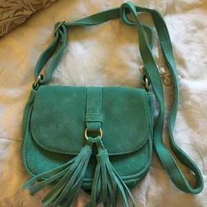 Zenith cross body green suede bag