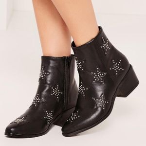 Black ankle booties with star shaped studs