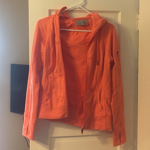 Salmon colored athletes jacket