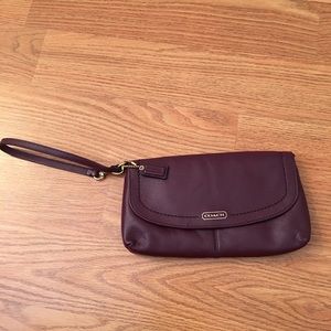 Coach leather large flap wristlet.
