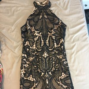 Black and gold lace Bebe dress