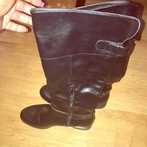 Black below the knee boots