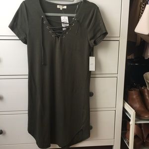 Green lace up front body con dress