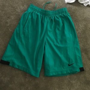 Turquoise Nike basketball shorts women's