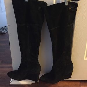 Black above the knee boots