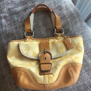 Vintage coach purse in pastel yellow