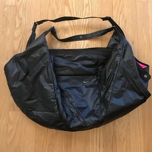Black Nike Victory women's gym bag.