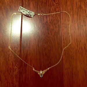 NWT gold necklace w/blue topaz stone.