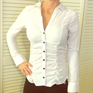 White long sleeved button up blouse