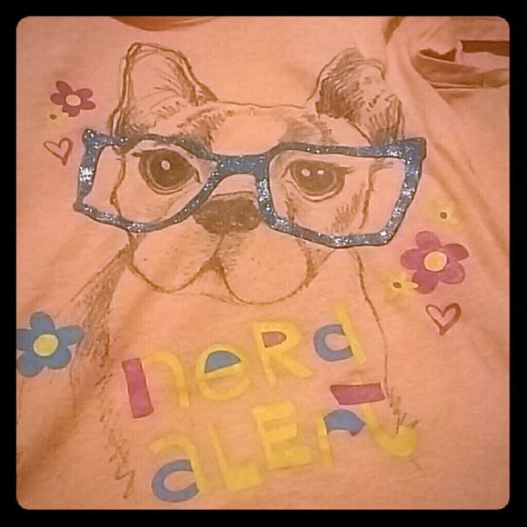 A colorful shirt with a cute dog