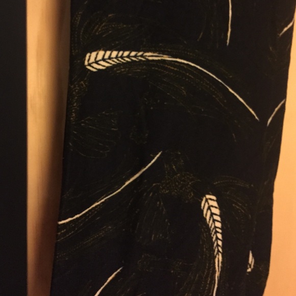 ElegantNwt gold blkfeathers black tc holiday