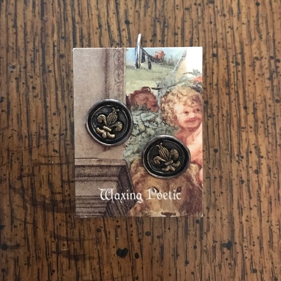 Waxing Poetic fleur de lis earrings.