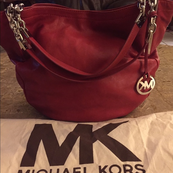 Michael Kors red leather Hand bag. - Picture 1 of 3