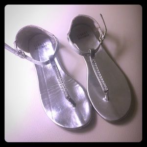 Stewart Weitzmann silver sandals.
