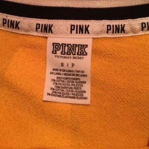 yellow PINK sweater.
