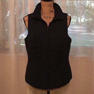 Navy sleeveless zippered vest