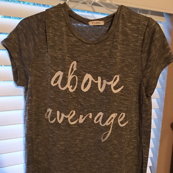 Small gray tunic "above average" message on front