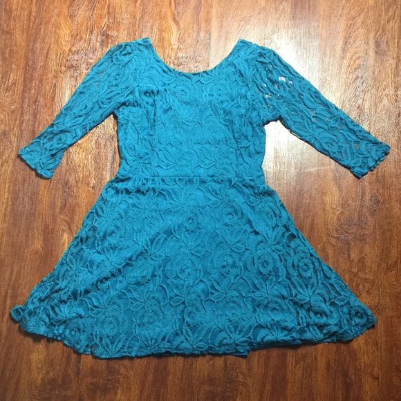 Teal dress with peak-a-boo sleeves