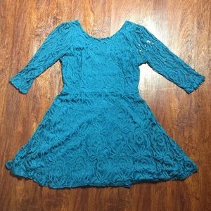 Teal dress with peak-a-boo sleeves