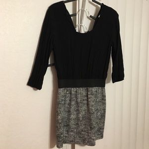 Tight-fitting black and grey dress