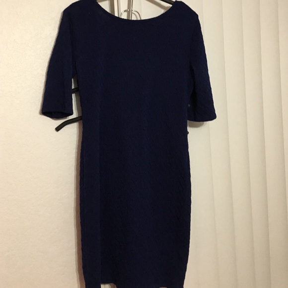 Cute tight-fitting navy blue dress. ONLY WORN ONCE