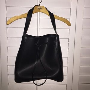 Tote with adjustable strap