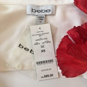 bebe Tops - Bebe sleeveless button-down open drape back top bebe Tops - Bebe sleeveless button-down open drape back top
