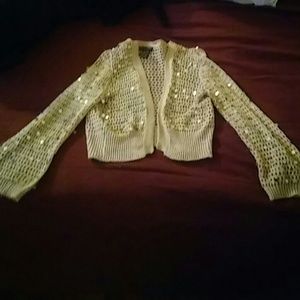 Beige colored bolero style jacket