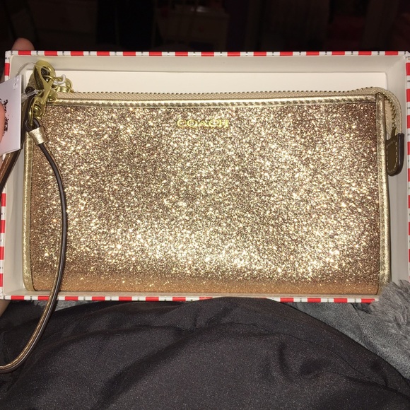 Coach gold wristlet