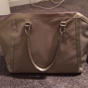 NWT large gold duffel / gym bag