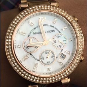 MK rose gold watch .