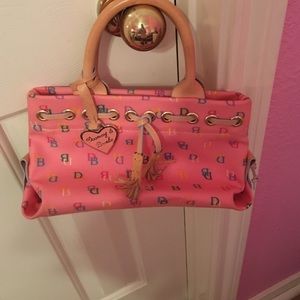 Small pink Dooney and Bourke purse