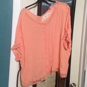 Peach colored shirt
