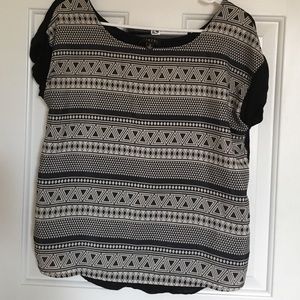 Black and patterned top