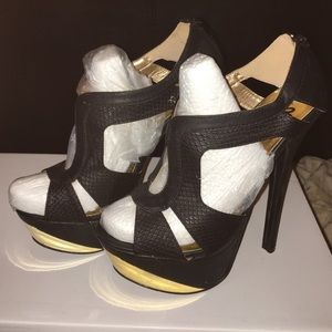 Bebe black and gold heels