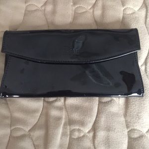 Black Dior patten leather clutch