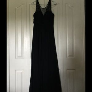 Long, black dress, with sequin embroidered top