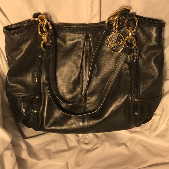Black Coach bag with gold trim.