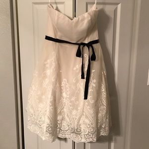 Ivory lace dress with black ribbon belt