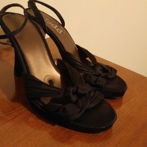 Black heels. Size 7.5. The brand is Mudd.