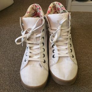 White hi-top sneakers